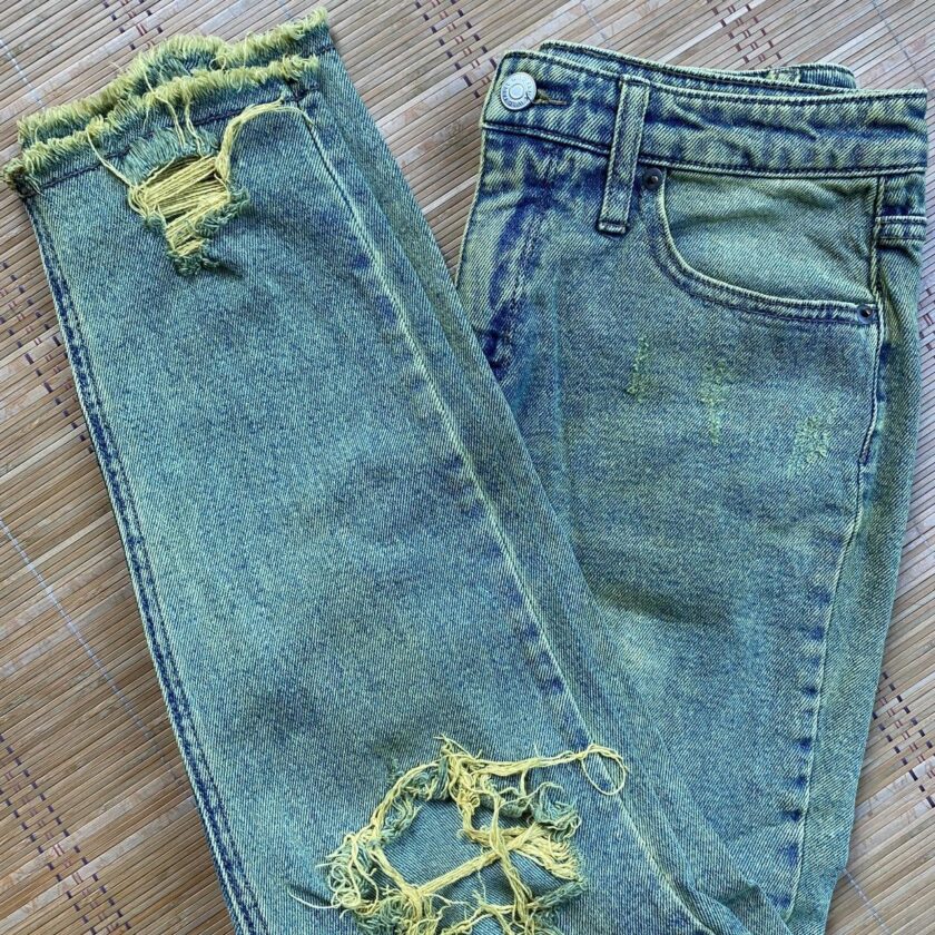 A pair of jeans with holes in them.