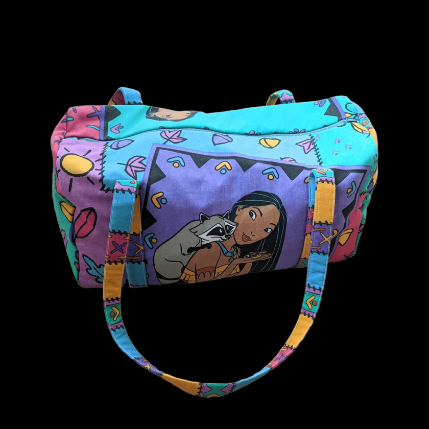 A colorful bag with cartoon characters on it.