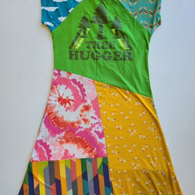 A girl's dress with a colorful pattern on it.