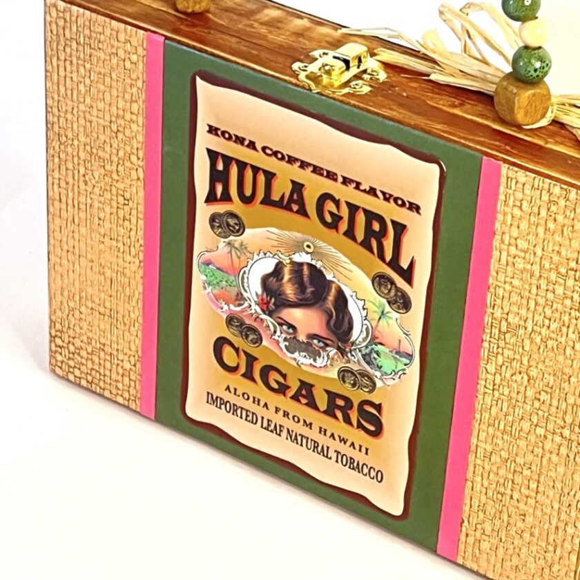 A wooden box with a label for hula girl cigars.