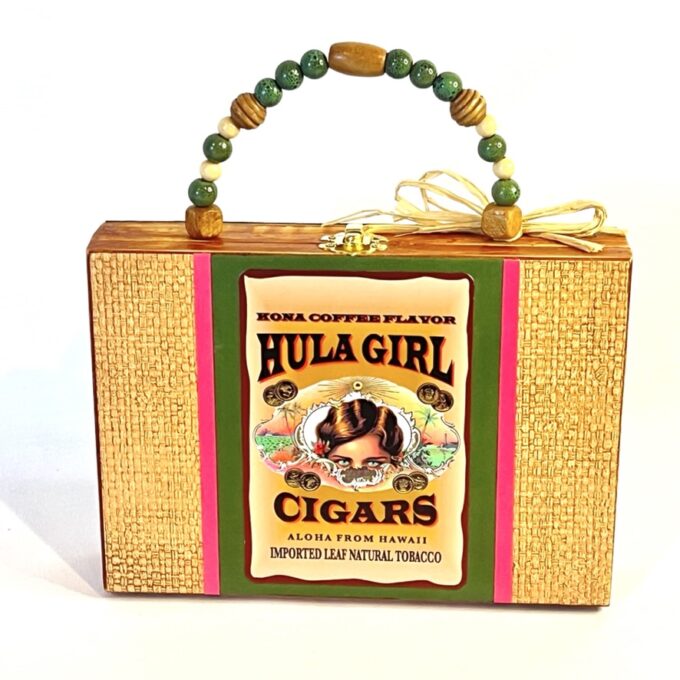 A wooden box with a label that says hula girl cigars.