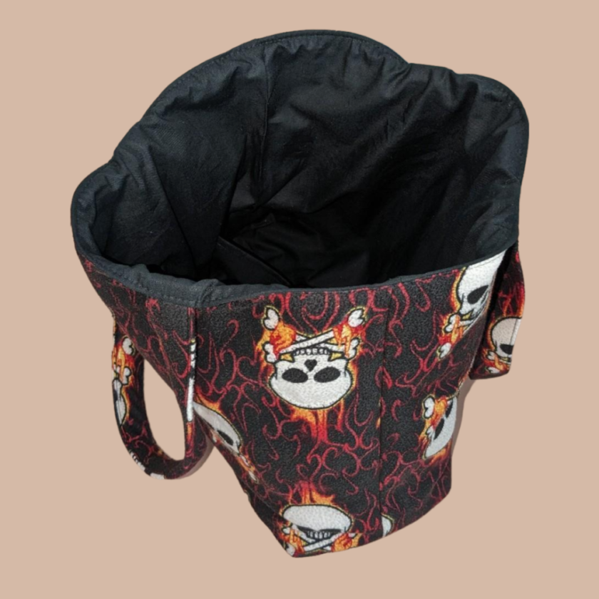 A bag with skulls and flames on it.