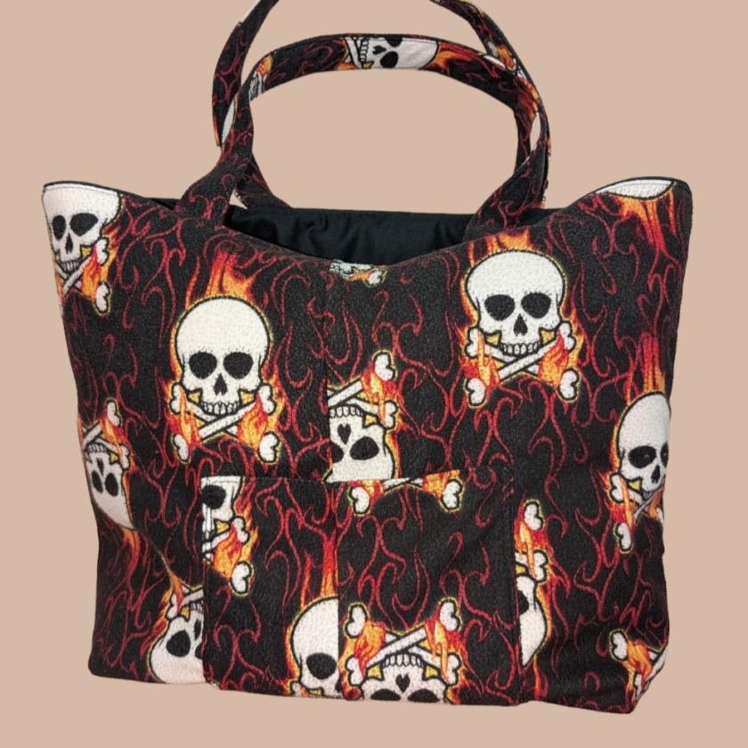A bag with skulls on it.