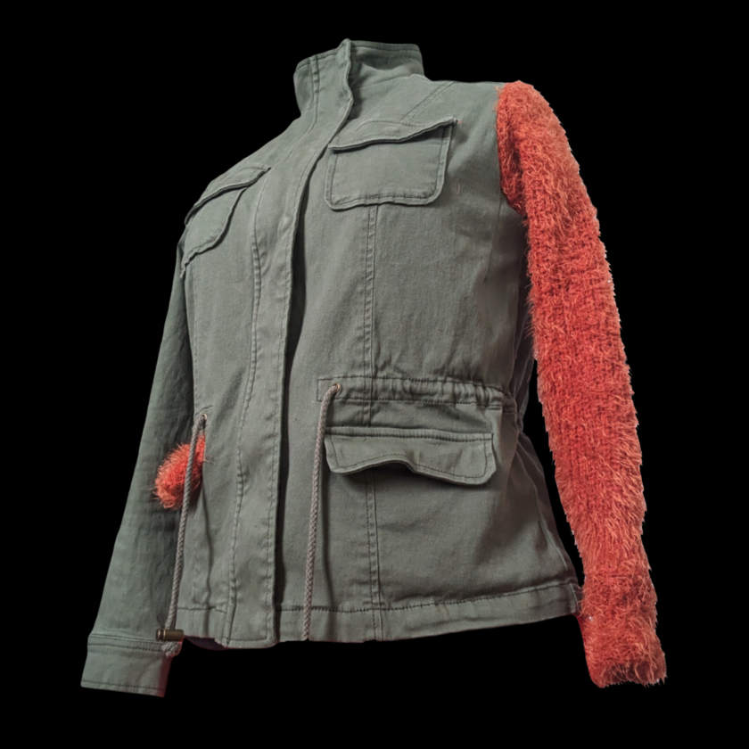 A jacket with a furry sleeve and orange sleeve.