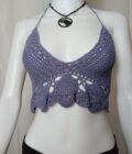 A belly dancer style purple crochet top