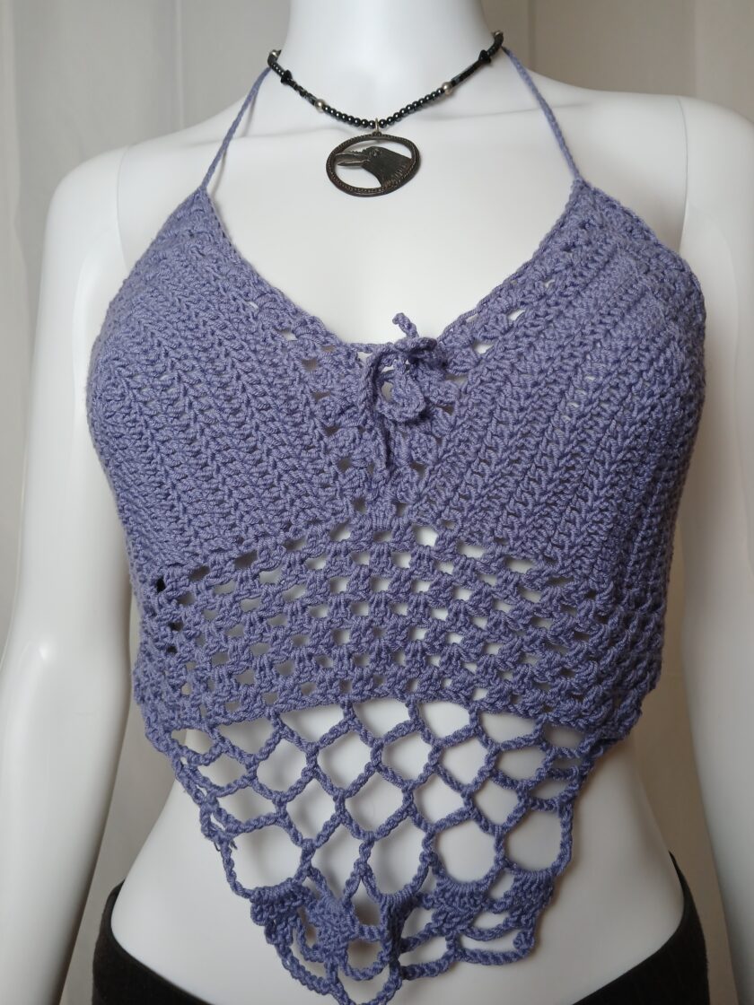 A lacey crochet crop top in purple