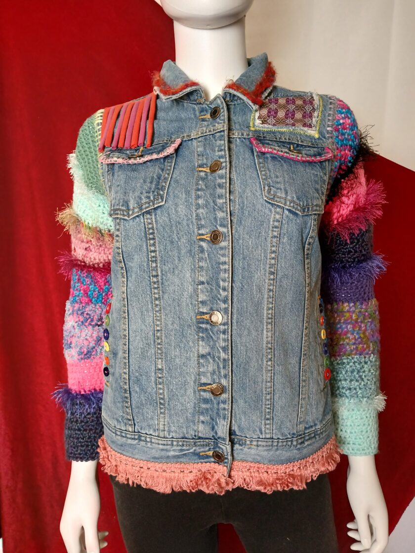 70s style hippie boho denim jacket with crochet sleeves and fringe