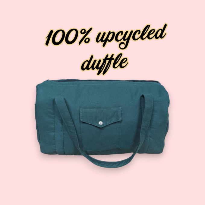 Green duffle bag on a pink background with the text "100% upcycled duffle" above it.