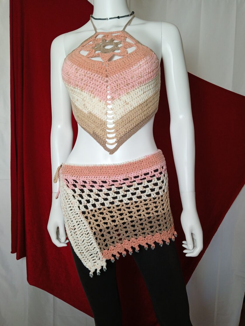 Unique crochet lotus halter and beaded, fringed hip scarf skirt in Neapolitan ice cream colors.