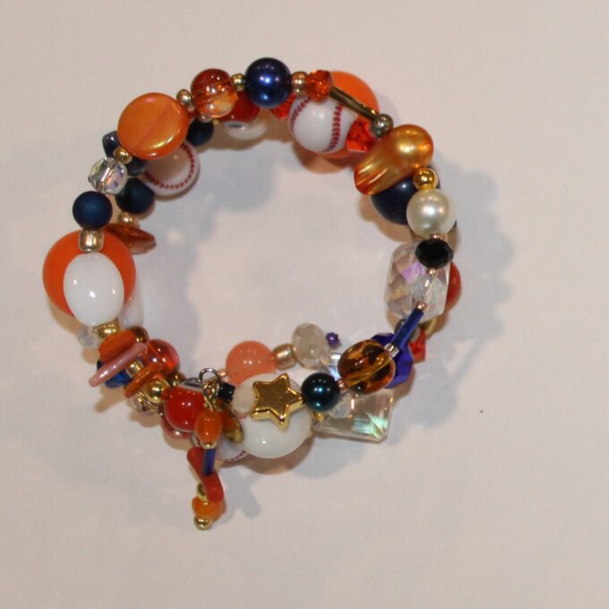 Beaded wrap bracelet with crystals and orange and blue astro color beads with little baseball beads